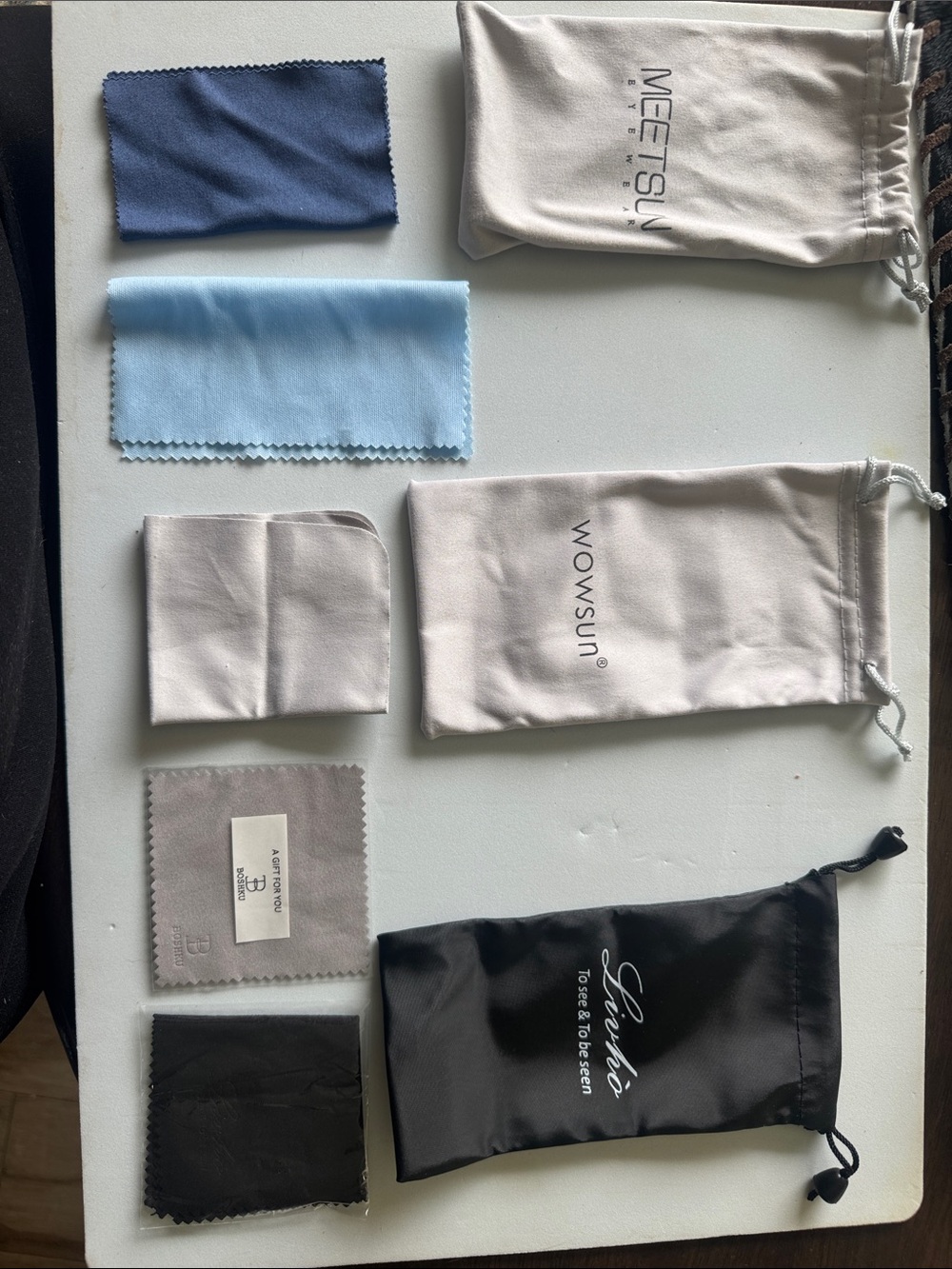 Assorted Microfiber Pouches & Cleaning Cloths - Neutral, Black, Blue